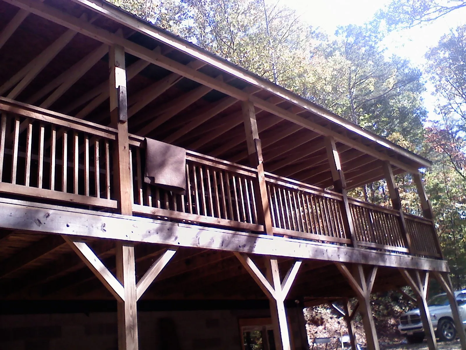 Timber framing under a new elevated porch and deck — Roof Leak Repair in Pine Bluff by Roofing Brothers